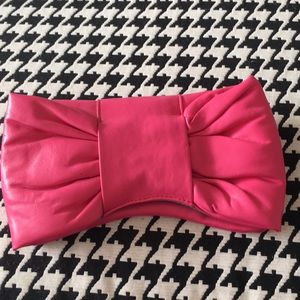 Hot pink bow clutch